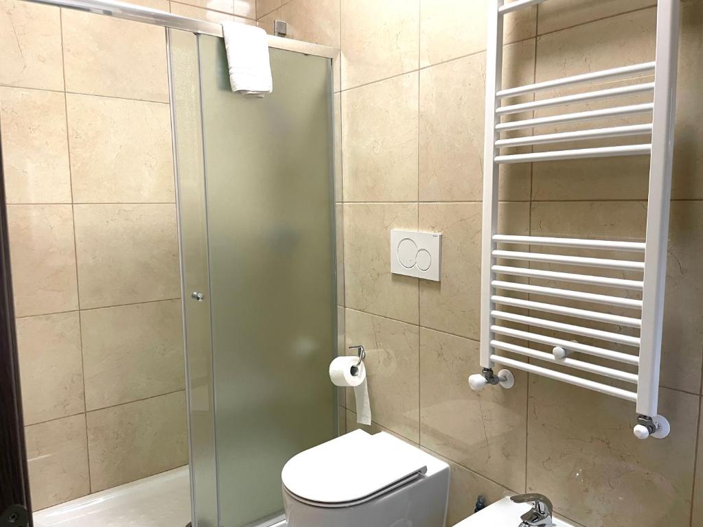 Koupelna v ubytování FIERA ROOMS