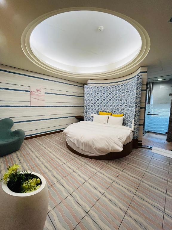 Postel nebo postele na pokoji v ubytování Walker Hotel - Chengde