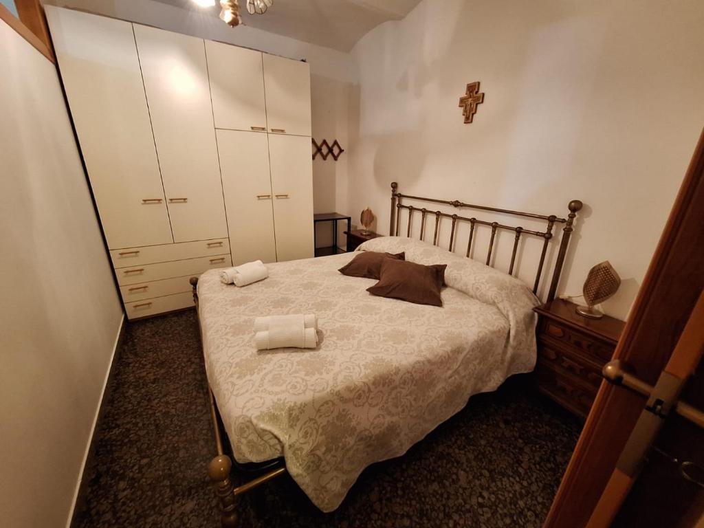 a bedroom with a bed with two towels on it at Da Venere in Vasto