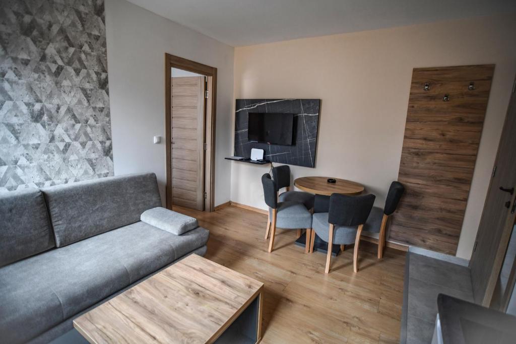 Posezení v ubytování Apartments and rooms Max-Well