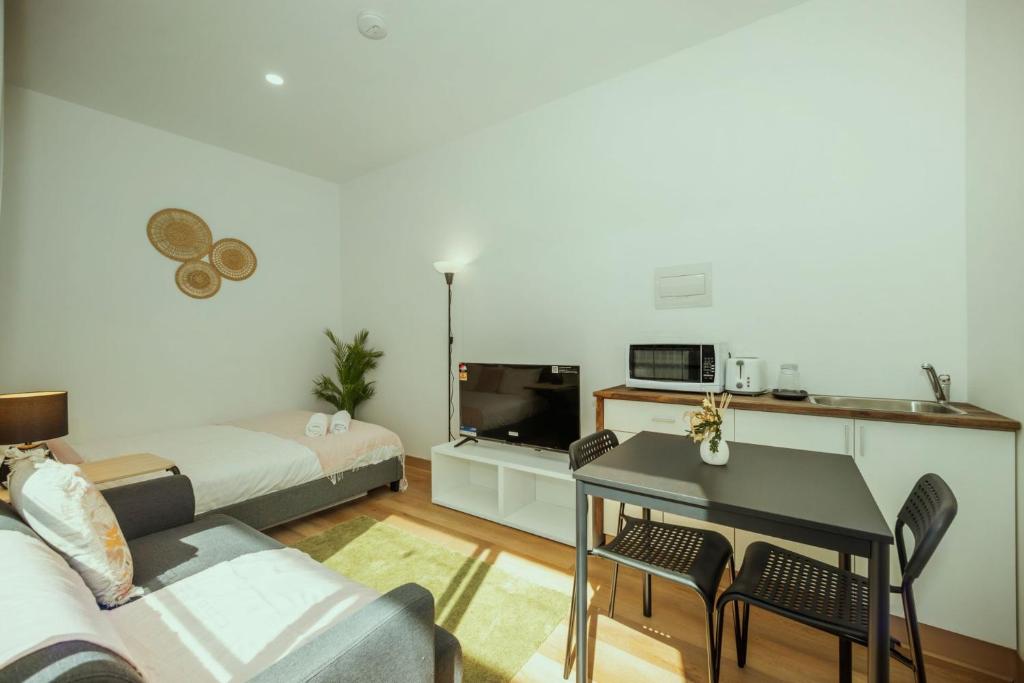 TV a/nebo společenská místnost v ubytování Stellar Residence #2