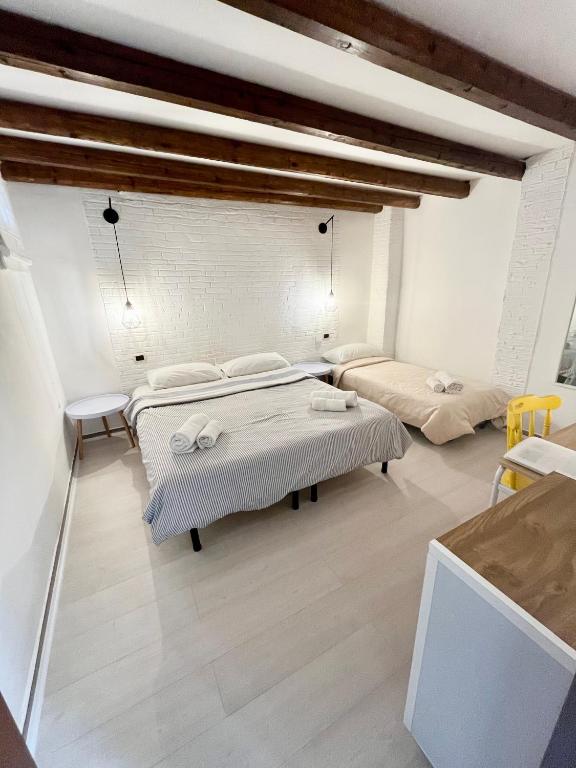 Łóżko lub łóżka w pokoju w obiekcie Casa Myrtos
