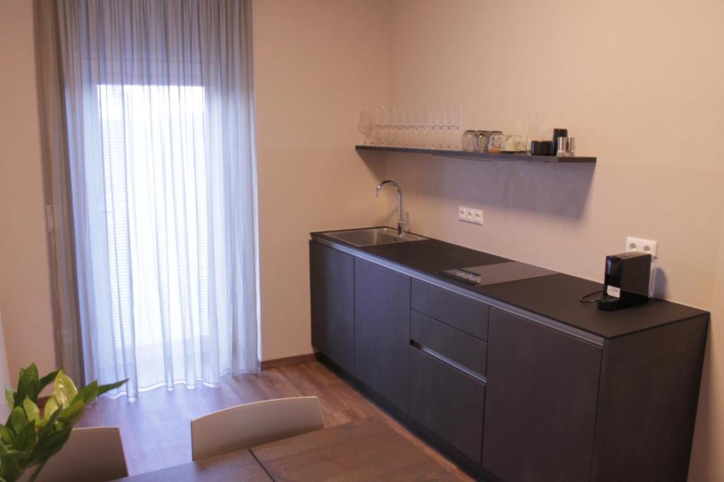 Kuchyň nebo kuchyňský kout v ubytování Trautes Quartier
