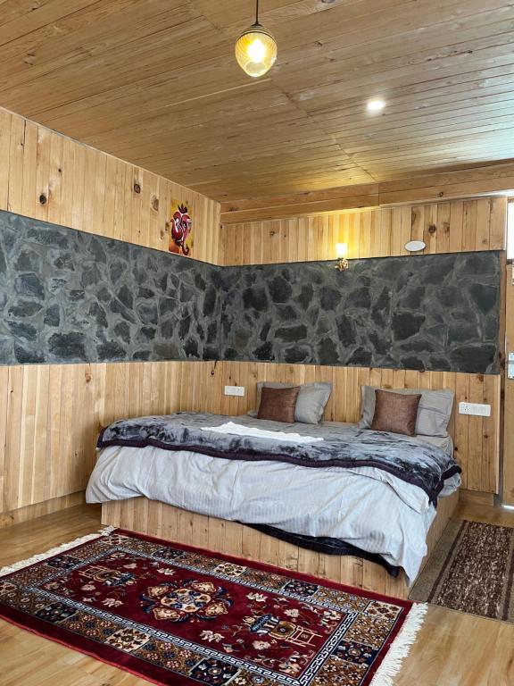 Postel nebo postele na pokoji v ubytování HRH By Hostalgic