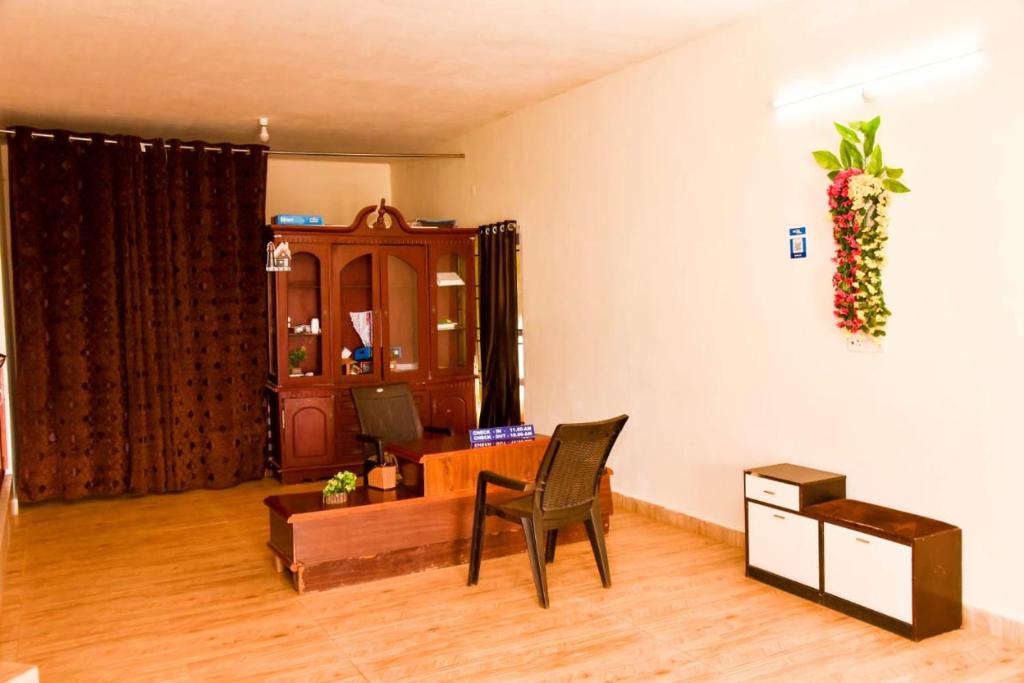 Posezení v ubytování Phoenix View Stay Ooty