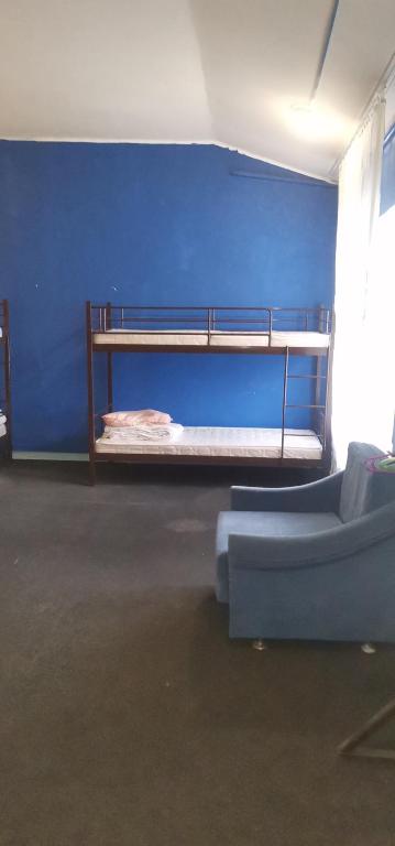 Postel nebo postele na pokoji v ubytování Kosher Hostel