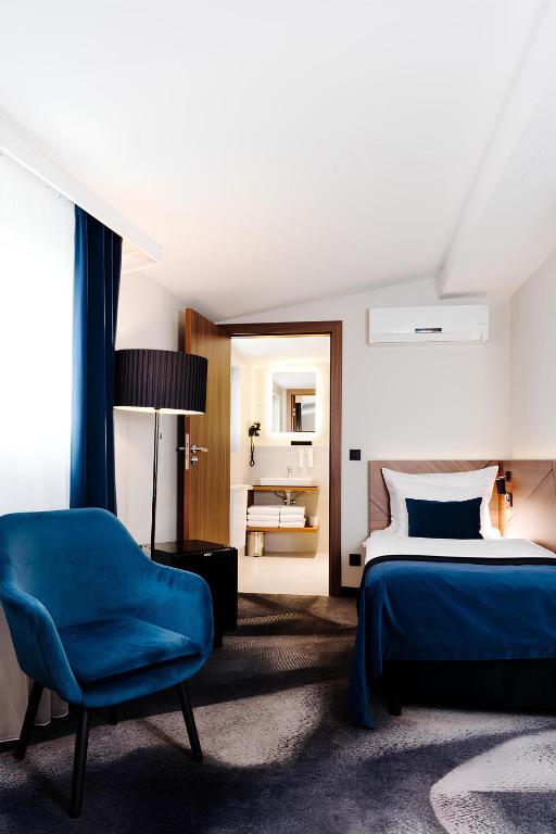 Posteľ alebo postele v izbe v ubytovaní Ascot Premium Hotel
