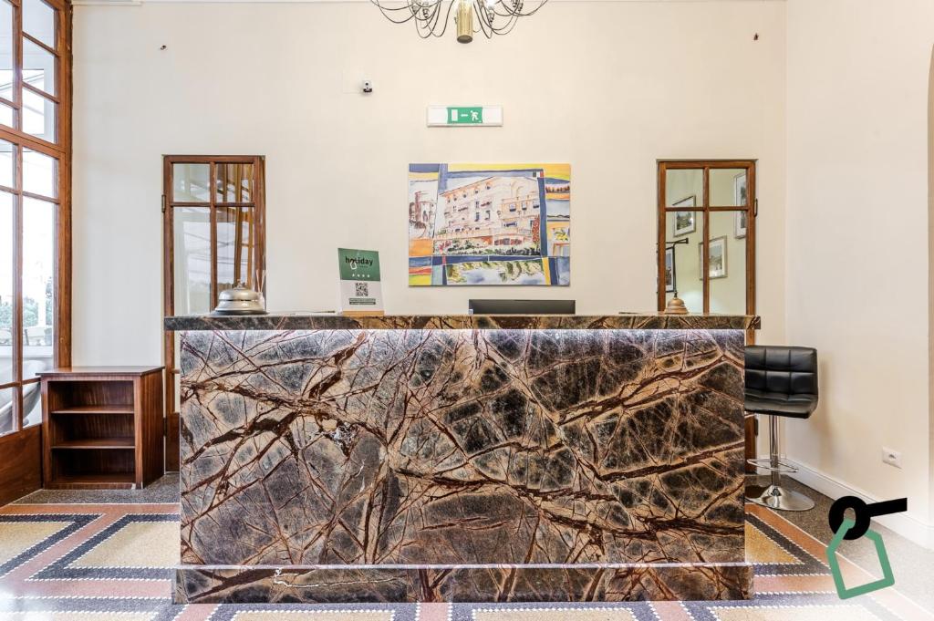 Posezení v ubytování Hotiday Room Collection - Rapallo