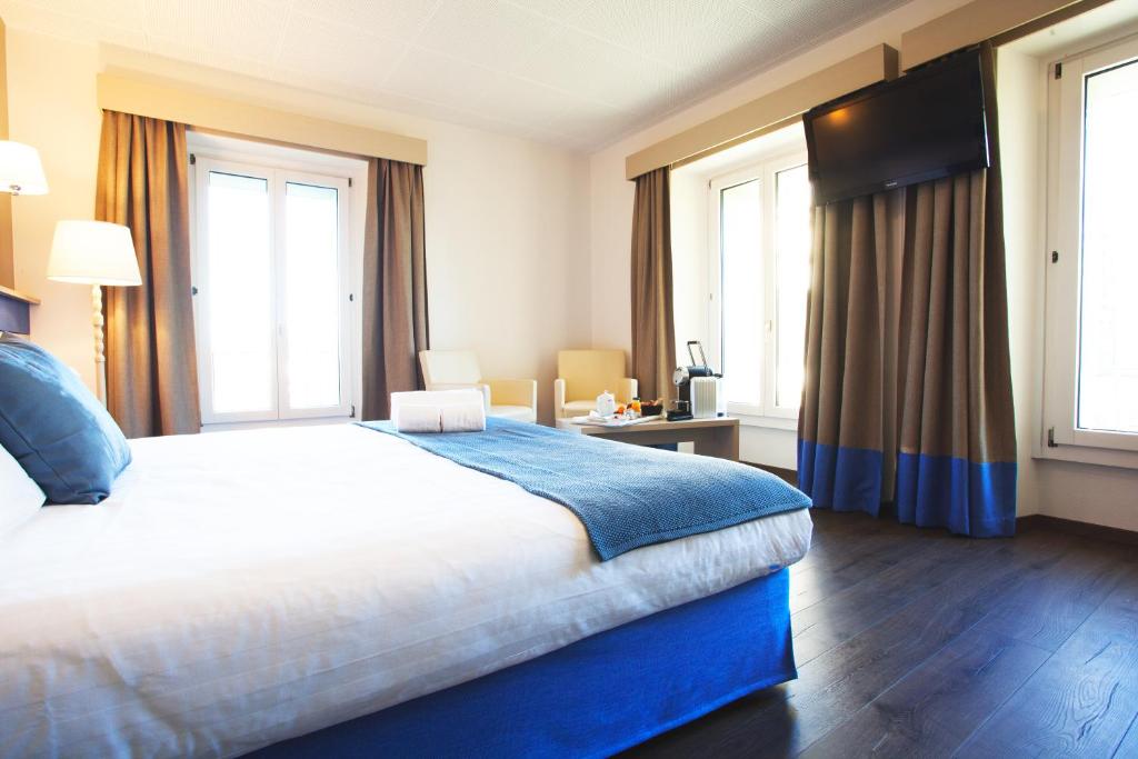 Postel nebo postele na pokoji v ubytování Hotel La Longeraie