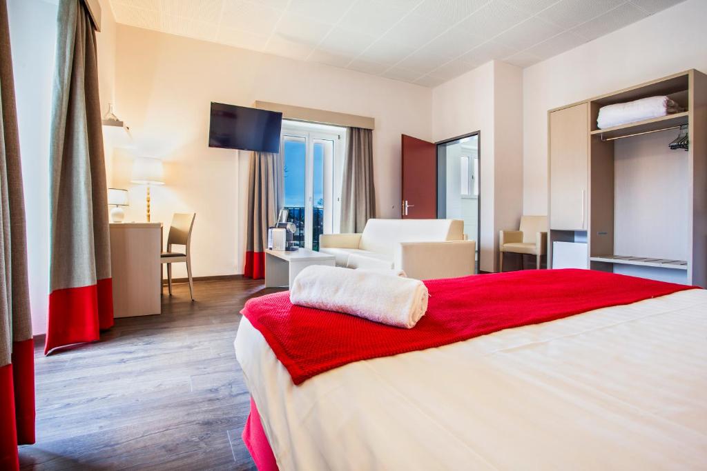Postel nebo postele na pokoji v ubytování Hotel La Longeraie