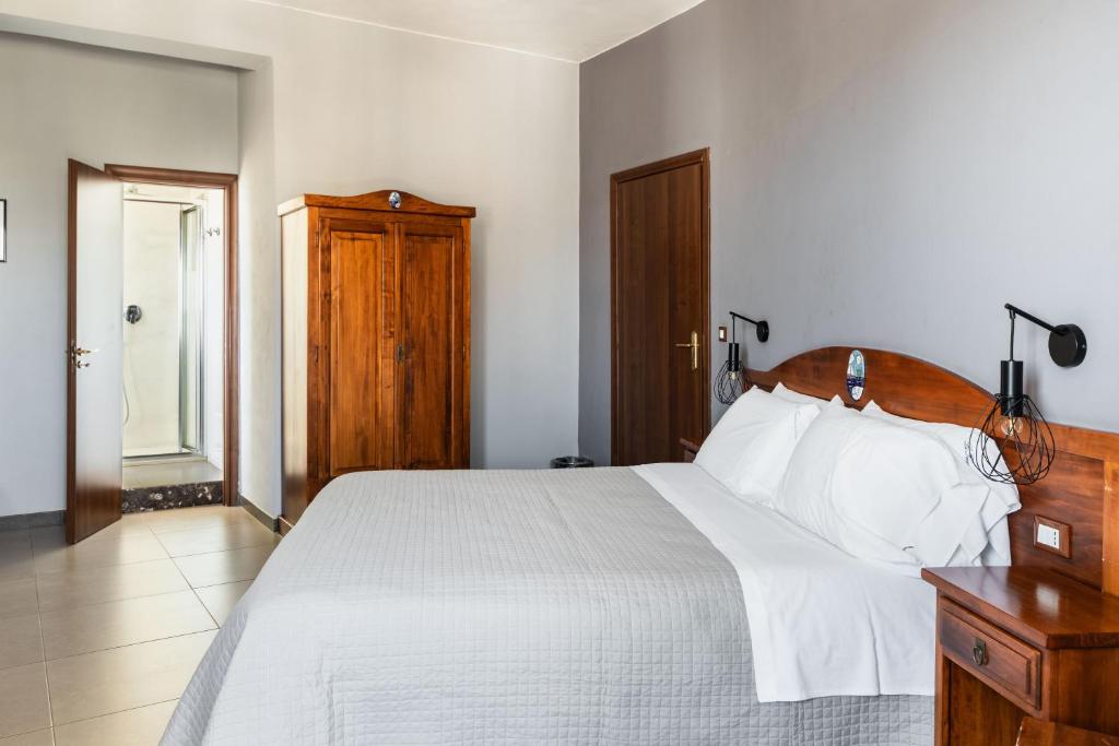 Postel nebo postele na pokoji v ubytování B&B La terrazza sul mare