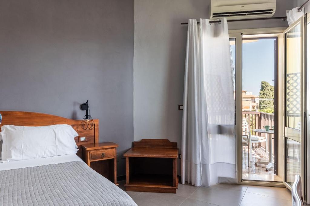Postel nebo postele na pokoji v ubytování B&B La terrazza sul mare
