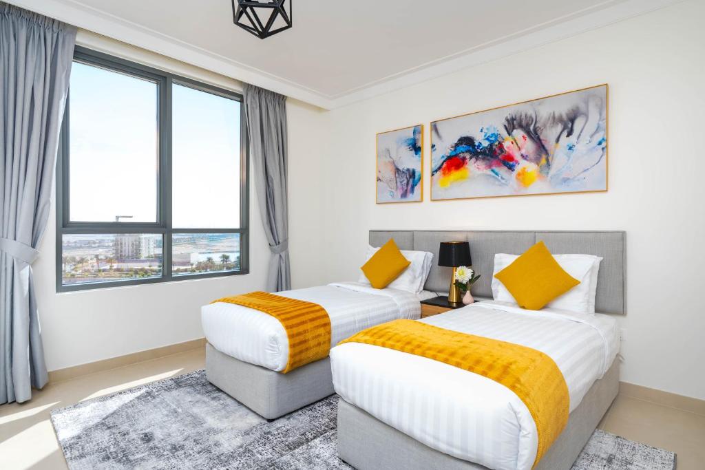 Postel nebo postele na pokoji v ubytování Ultimate Stay / 7 people / Spacious / Dubai Creek with Marina Views