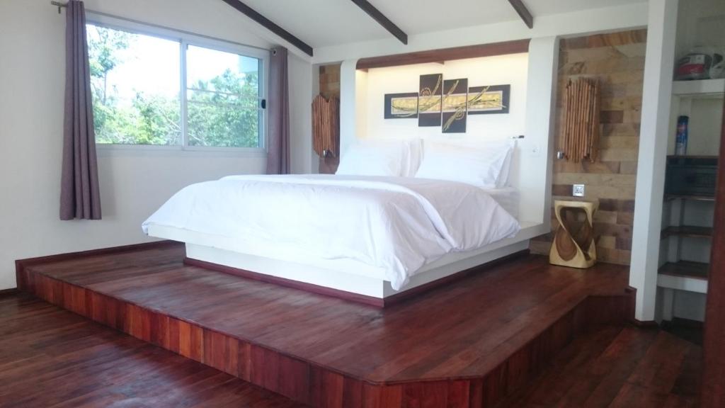 Postel nebo postele na pokoji v ubytování Horizon Luxury Pool Villas Koh Tao