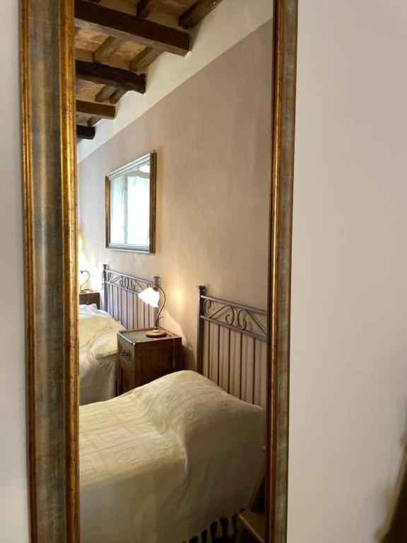 Postel nebo postele na pokoji v ubytování Guesthouse da Idolina dal 1946