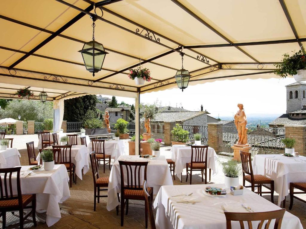 A restaurant or other place to eat at Giotto Hotel & Spa