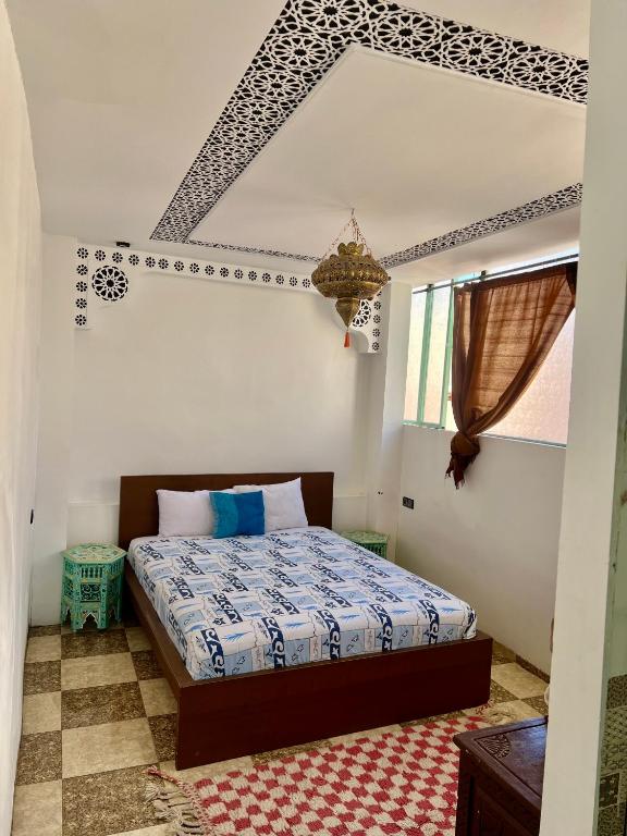 Postel nebo postele na pokoji v ubytování Riad Cascada
