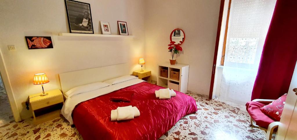 A bed or beds in a room at Casa Al Castello
