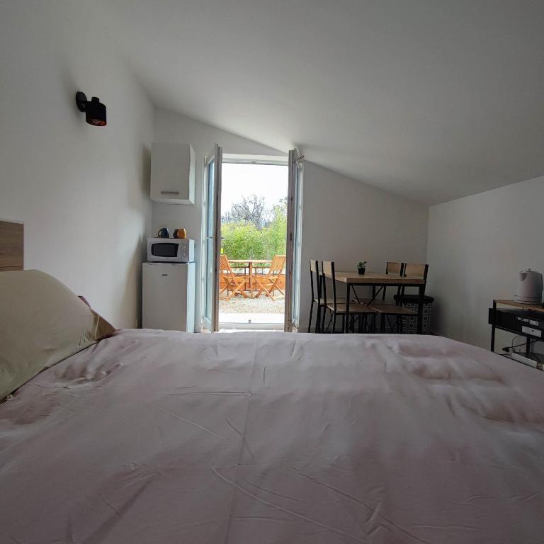 Postel nebo postele na pokoji v ubytování Chambre d'hôtes