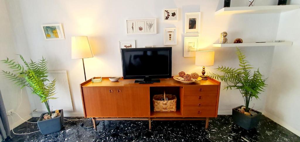 A television and/or entertainment centre at Casa Al Castello