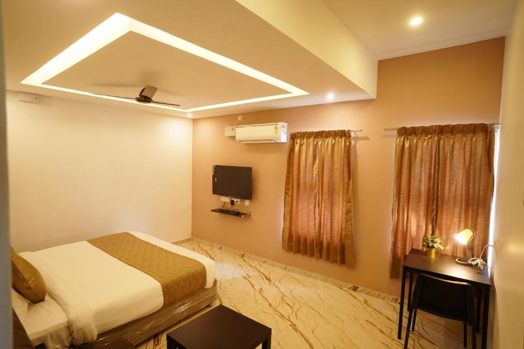 TV a/nebo společenská místnost v ubytování HOTEL VILVAAS