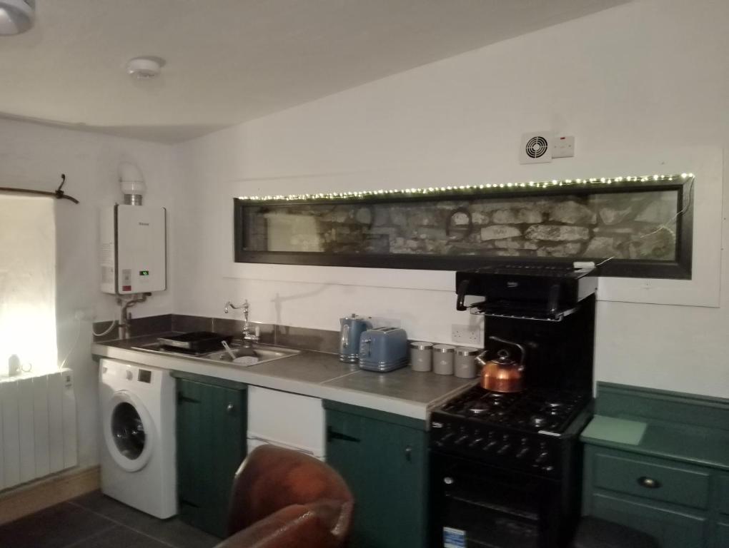 Kuchyň nebo kuchyňský kout v ubytování Blakes Barn in Carrigaholt