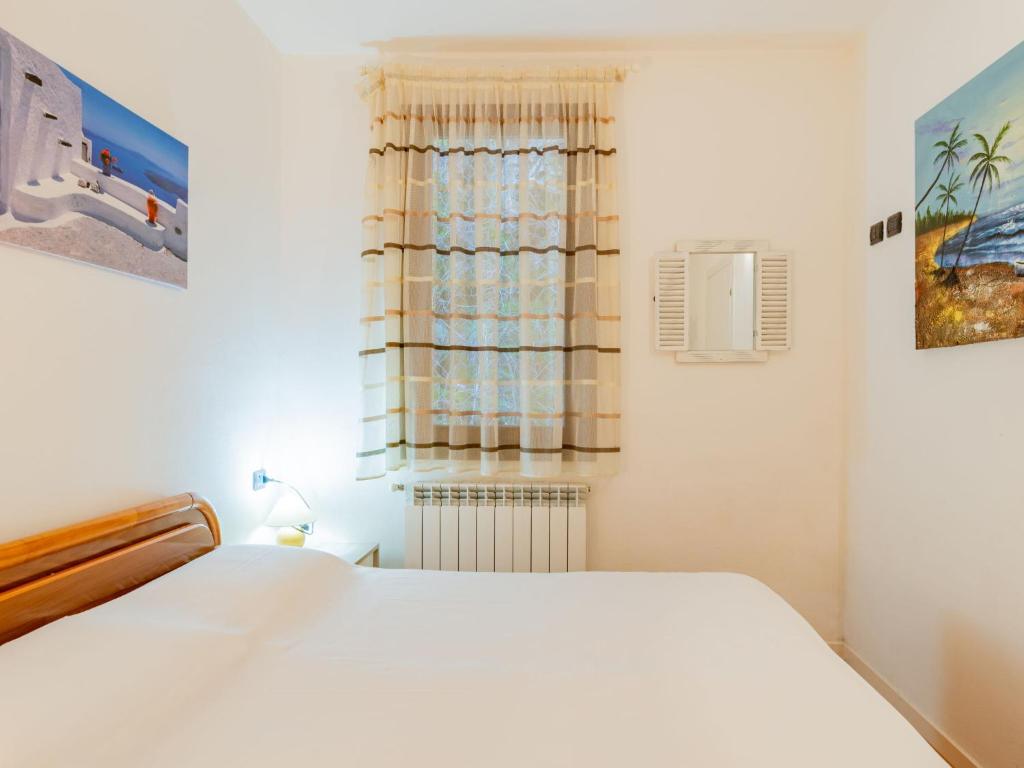 Posteľ alebo postele v izbe v ubytovaní Apartment Belvedere by Interhome