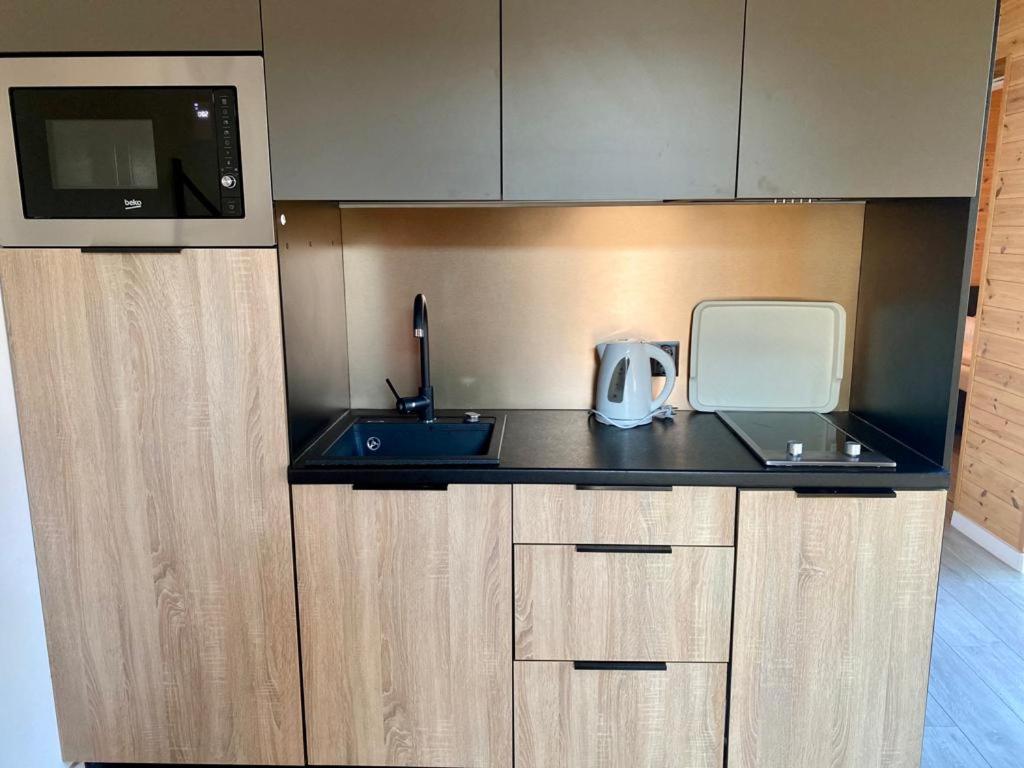 Kuchyň nebo kuchyňský kout v ubytování Elements Camping Selce Mobile homes