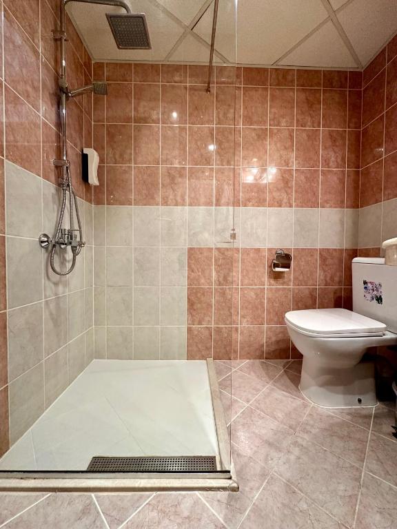Koupelna v ubytování Hotel Cosmos