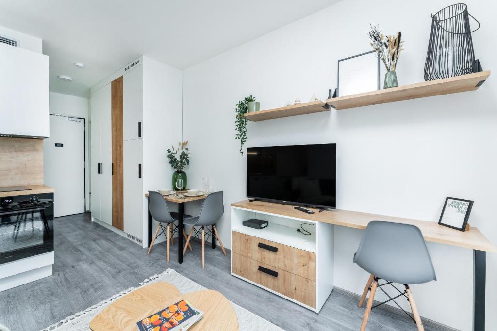 Kuchyň nebo kuchyňský kout v ubytování MyMozart Apartments Prague by Rentero Property