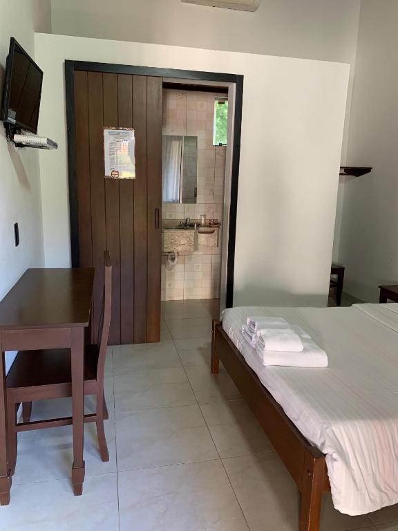 Postel nebo postele na pokoji v ubytování Hotel Il Castello