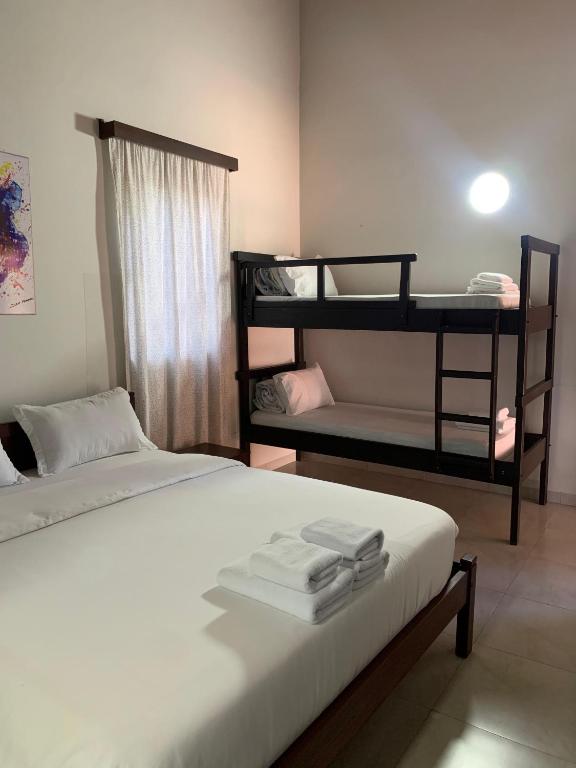 Postel nebo postele na pokoji v ubytování Hotel Il Castello