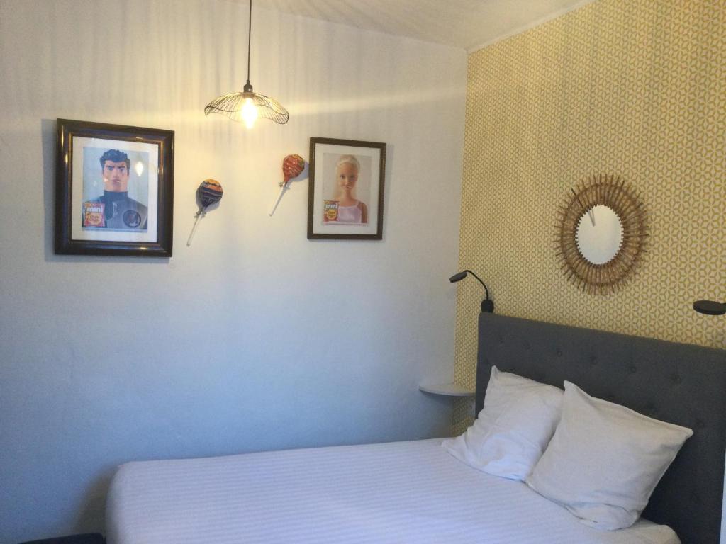 Postel nebo postele na pokoji v ubytování Hotel le Castellamar