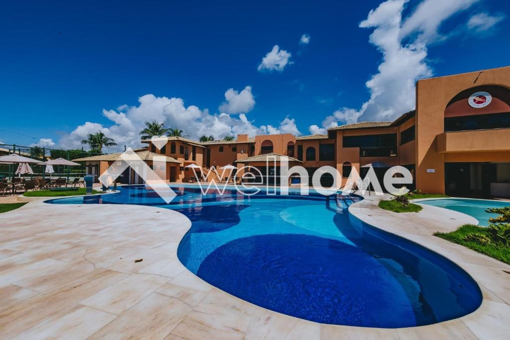 Flat com sacada à beira-mar em Guarajuba, na Bahia - Housity