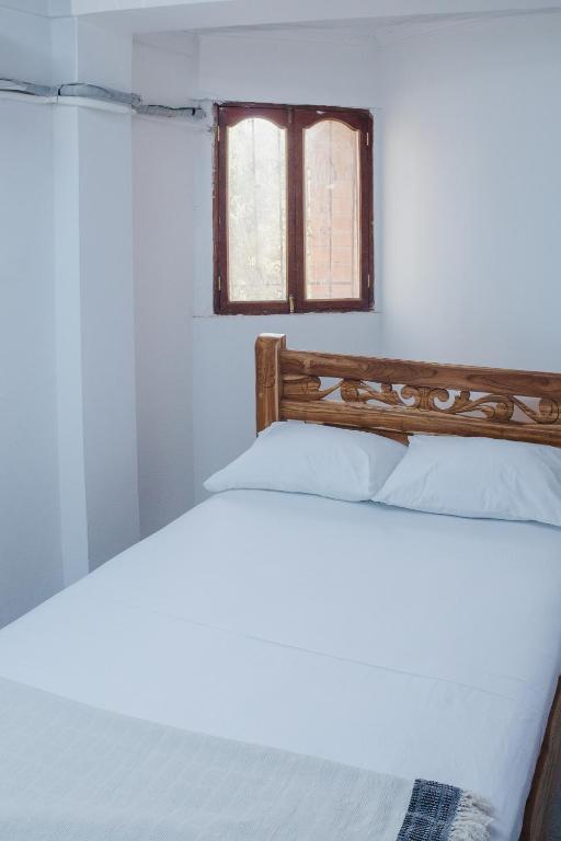 Cama o camas de una habitación en HOSTAL CASA TIO POLI
