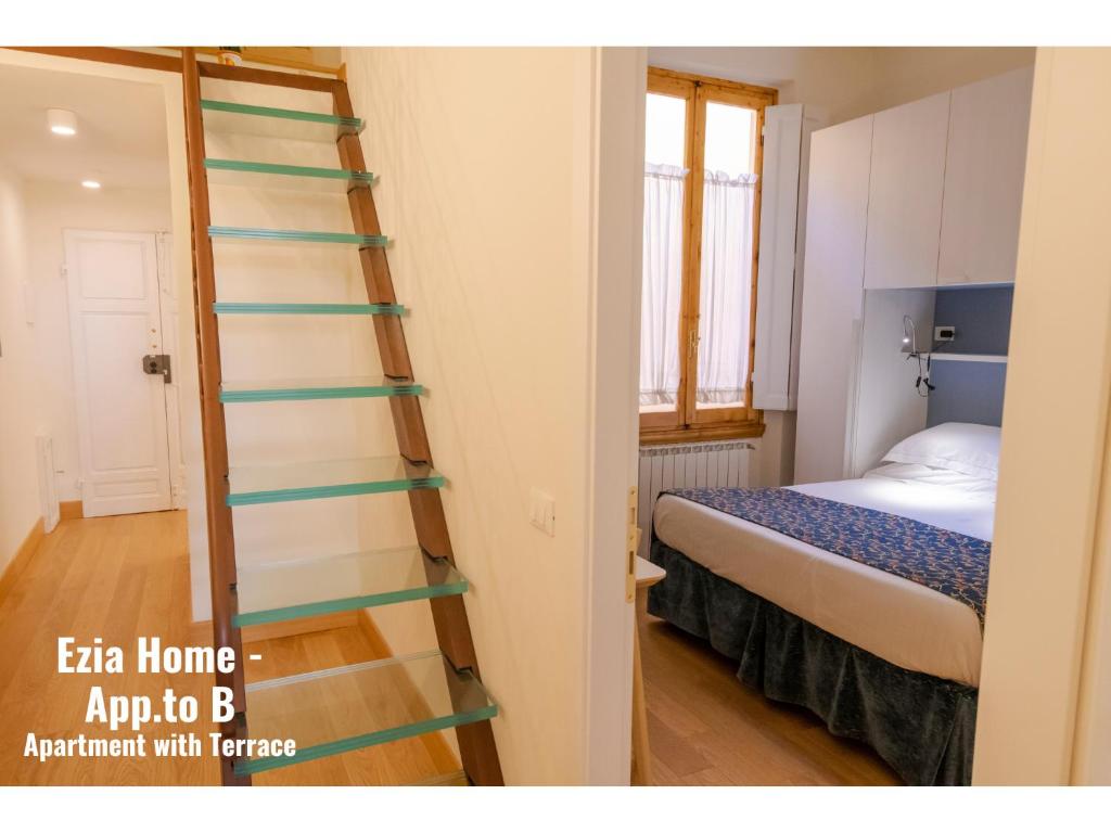 Posteľ alebo postele v izbe v ubytovaní Ars Home - Santa Maria Novella - Ezia Home & Ars Home 25