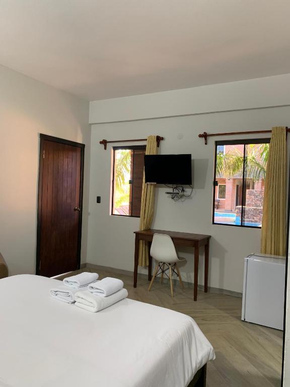 TV a/nebo společenská místnost v ubytování Hotel Il Castello