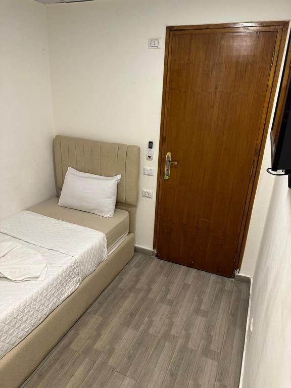 Postel nebo postele na pokoji v ubytování Egy Days Hotel