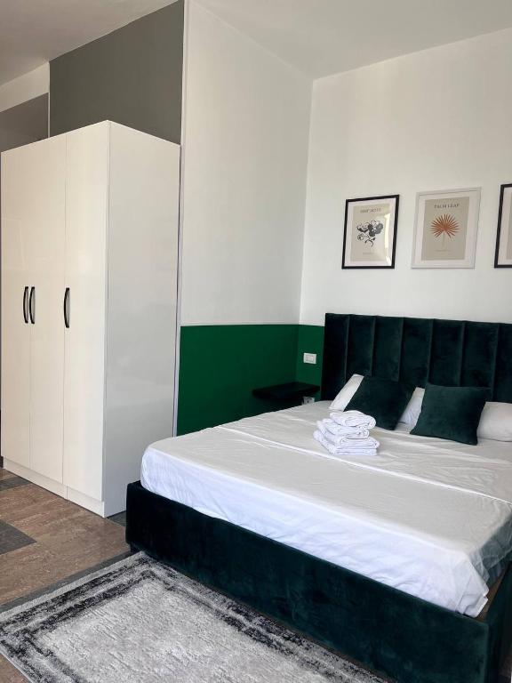 Postel nebo postele na pokoji v ubytování Cactus Apartments