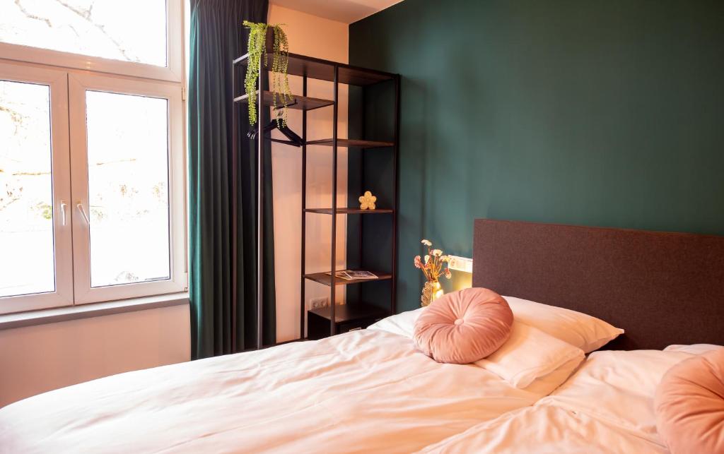 Postel nebo postele na pokoji v ubytování Hotel Bom
