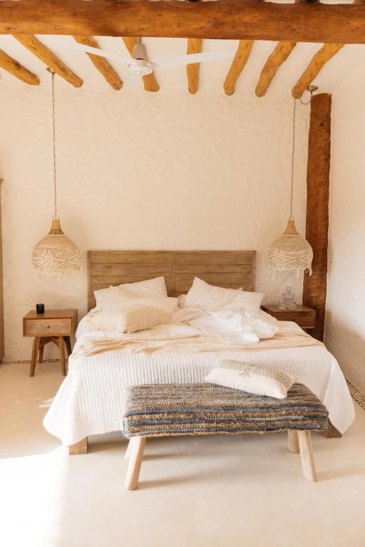 Postel nebo postele na pokoji v ubytování Casa Las Tortugas Petit Beach Hotel & Spa