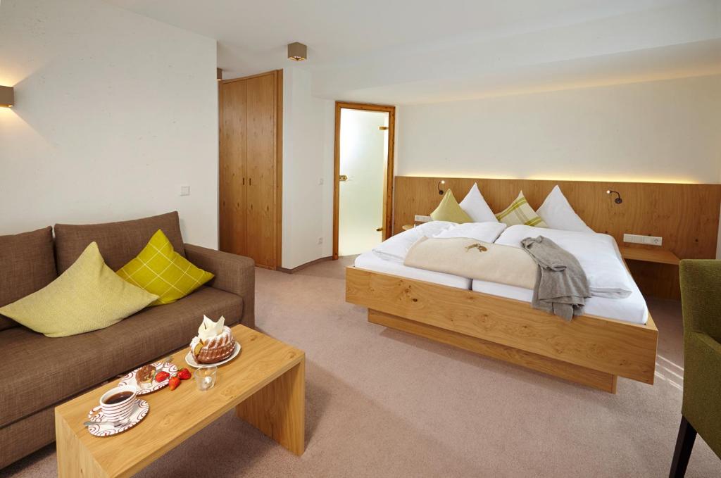 Postel nebo postele na pokoji v ubytování Hotel Waldhaus Föckinghausen