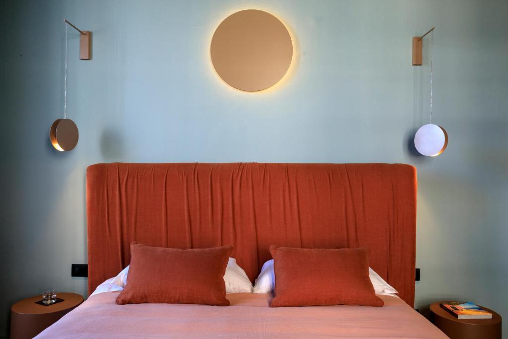 Postel nebo postele na pokoji v ubytování Belmonte Luxury Rooms - LR Collection