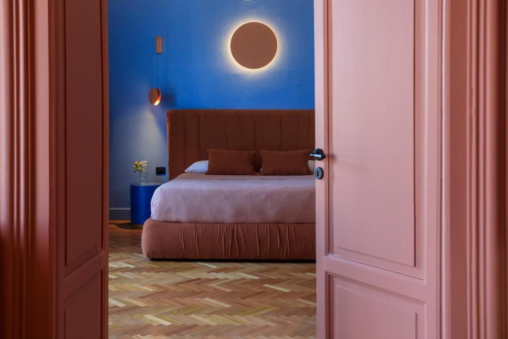 Postel nebo postele na pokoji v ubytování Belmonte Luxury Rooms - LR Collection
