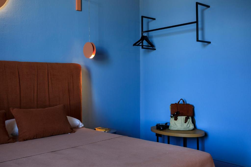 Postel nebo postele na pokoji v ubytování Belmonte Luxury Rooms - LR Collection