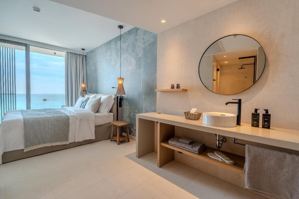 Postel nebo postele na pokoji v ubytování Blu Mare Hotel