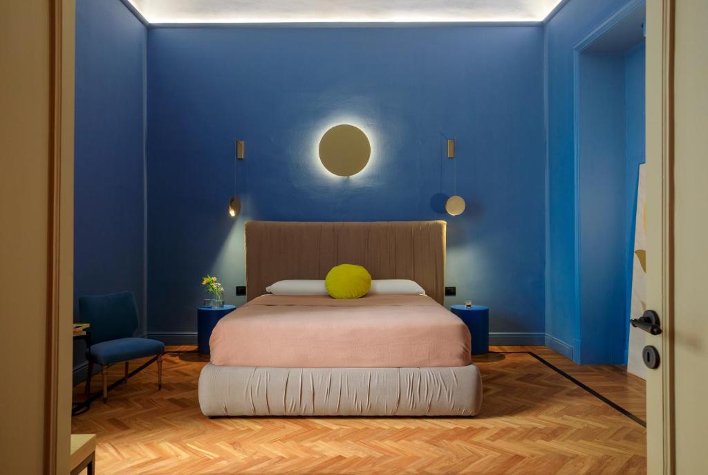 Postel nebo postele na pokoji v ubytování Belmonte Luxury Rooms - LR Collection