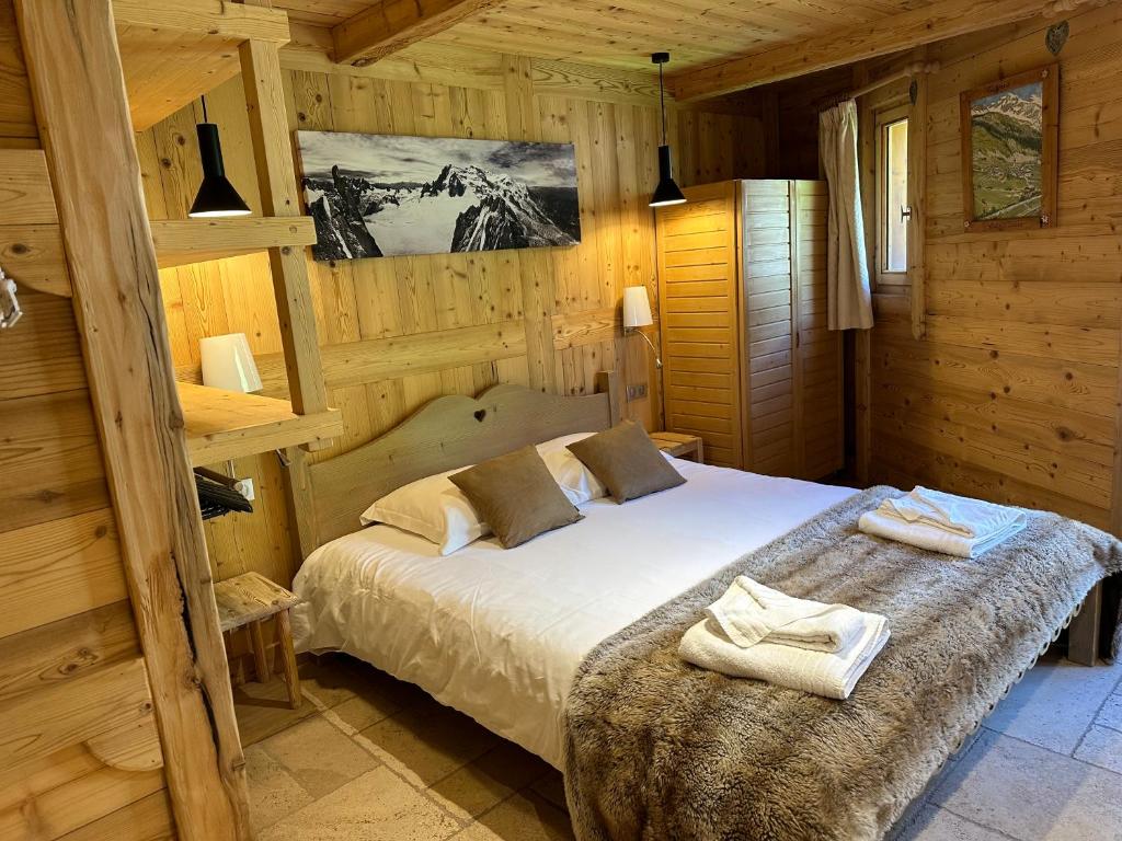 Postel nebo postele na pokoji v ubytování Chalet Barmaz