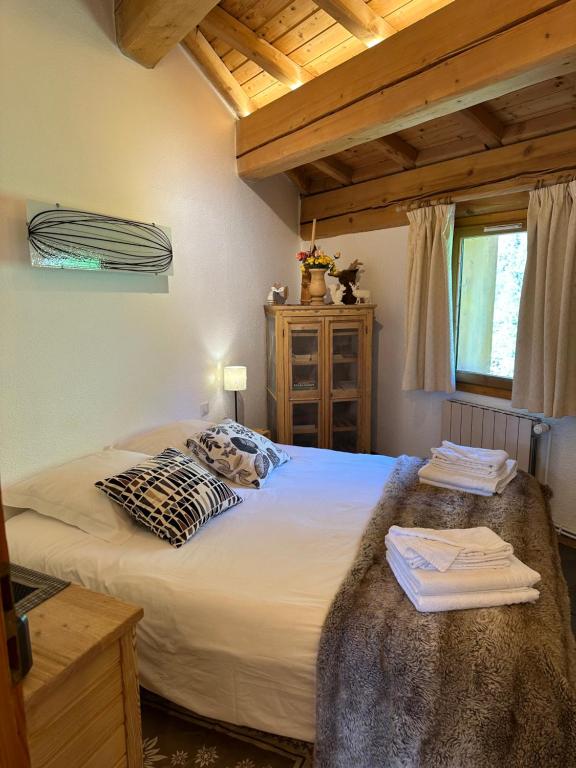 Postel nebo postele na pokoji v ubytování Chalet Barmaz