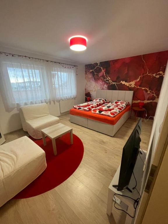 Postel nebo postele na pokoji v ubytování Apartmán U VINAŘSTVÍ v RD novostavba v Suchohrdly u Znojma